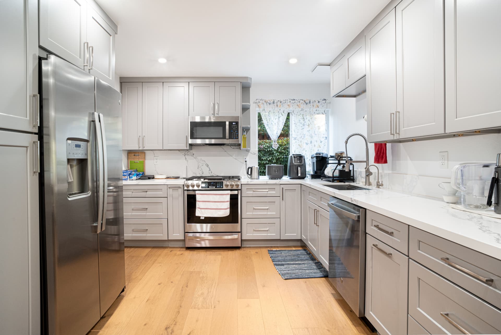 Spotless, tidy kitchen after professional cleaning by Purple Check Cleaning